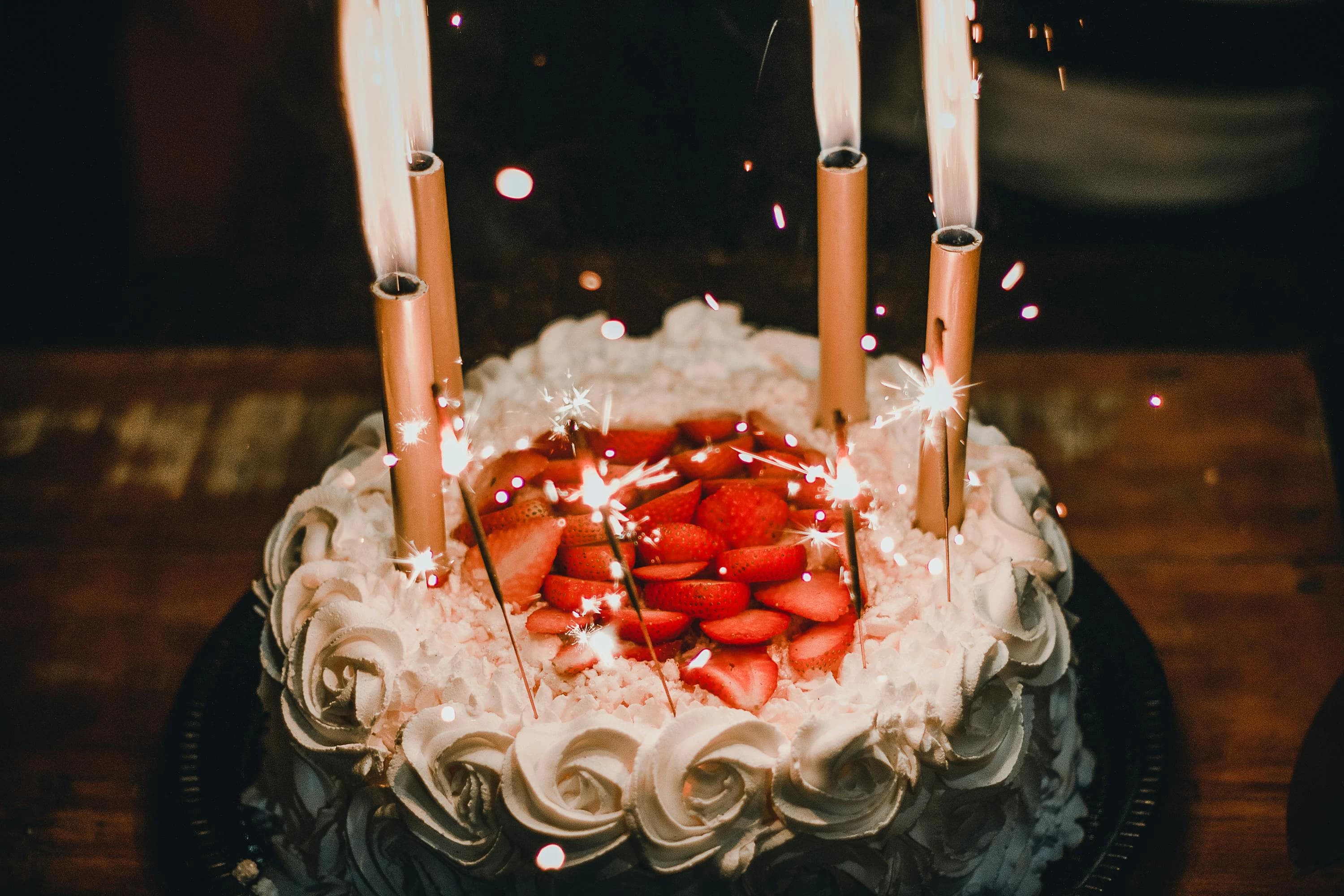 Candles on elegant cake (source: pexels.com)